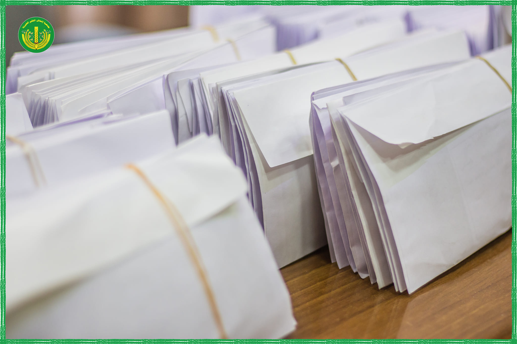 توزيع المساعدات المالية والعينية للشهر السادس